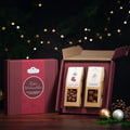 2 Weihnachts-Snacks im Geschenkkarton mit Logo - wellnuss Premium Präsente